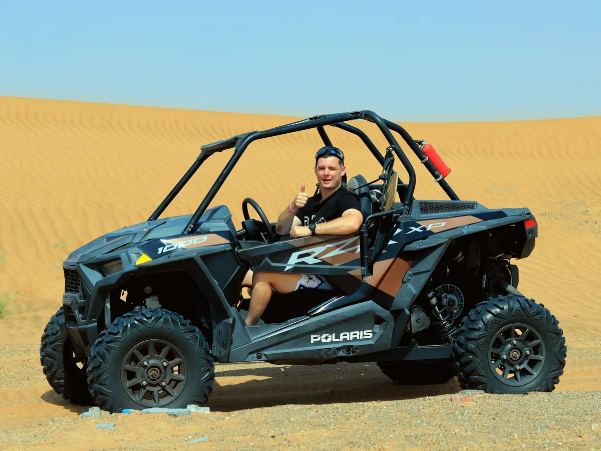 2-seater Dune Buggy 1000cc driving in Dubai red dunes