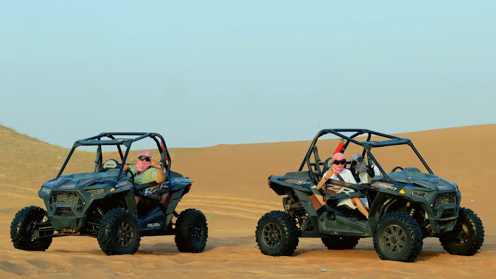 Self-drive dune buggy on Dubai red dunes